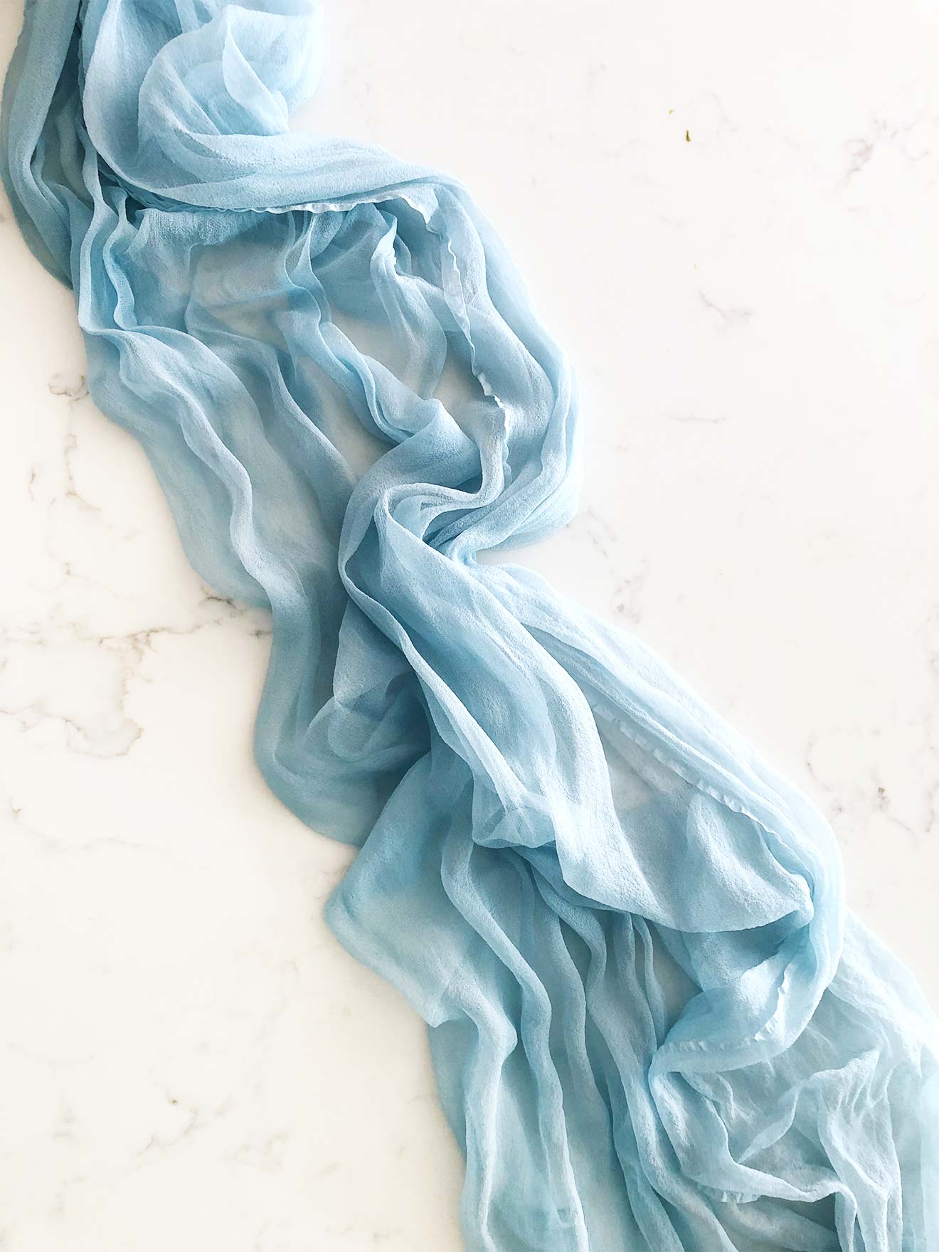 Handcrafted Gauss styling cloth in Glacier blue with frayed edges