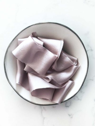 Handcrafted silk ribbon in Lavender Fog with frayed edges