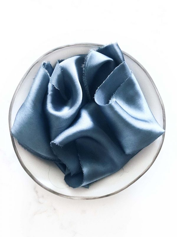Handcrafted silk ribbon in Deep Waters blue with frayed edges