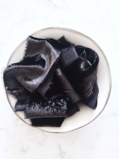 Handcrafted velvet ribbon in Ink Well Black with frayed edges