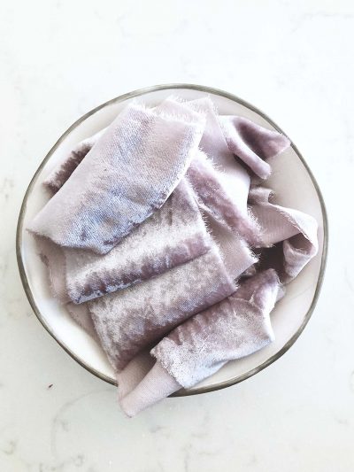 Handcrafted velvet ribbon in Lavender Fog with frayed edges